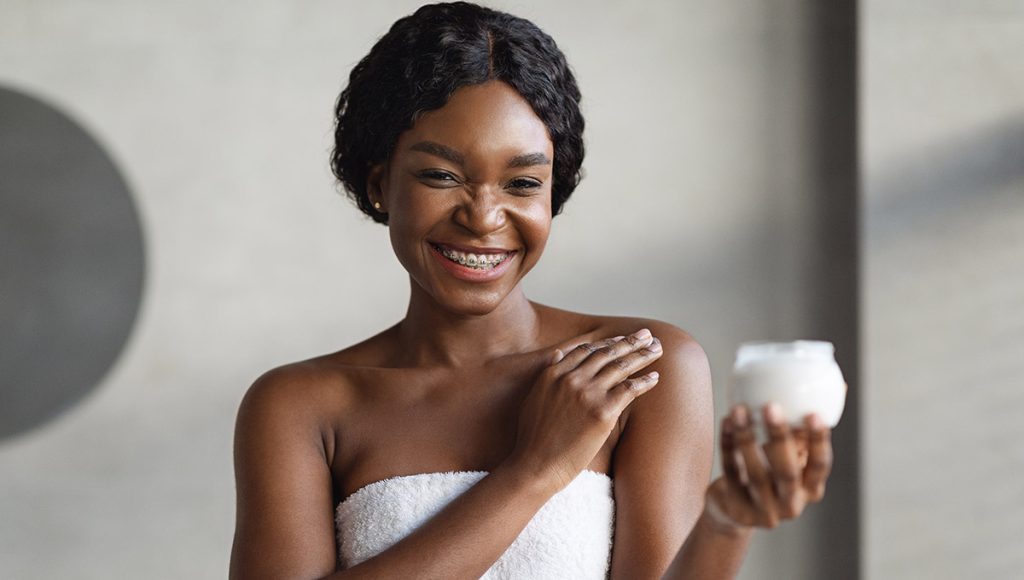 Using Exfoliating Pads to Boost the Effects of Your Dark Spot Removal Cream