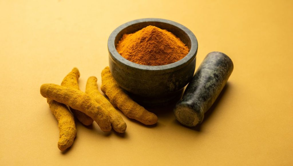 Using Turmeric for Glowing Skin with Coffee Body Scrubs